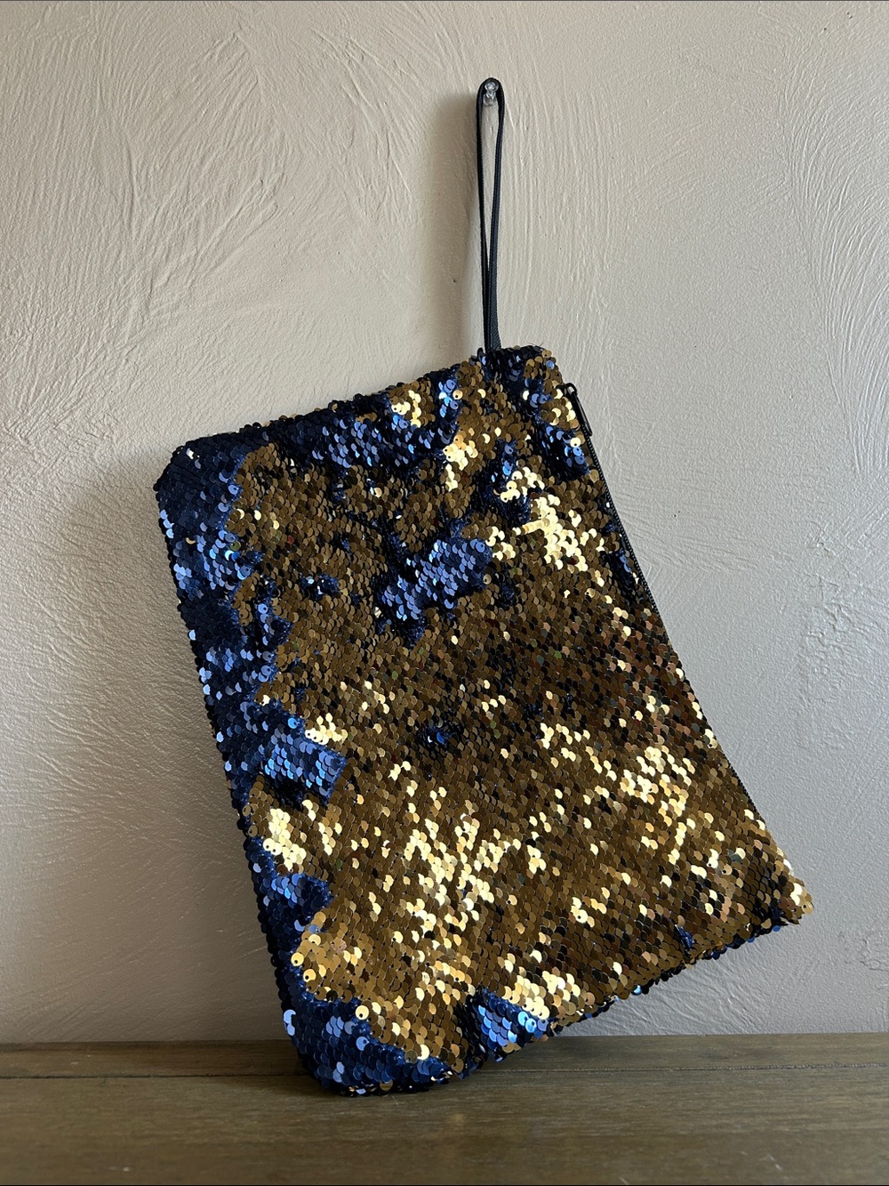 Reversible Sequin Wristlet Clutch in Gold & Navy